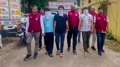 Delhi Police Crime Branch personnel with men who were arrested for their alleged involvement in an organ transplant racket on Tuesday, July 9, 2024. (PTI) Delhi Police Crime Branch personnel with men who were arrested for their alleged involvement in an organ transplant racket on Tuesday, July 9, 2024. (PTI)