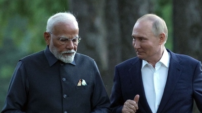 Russia's President Vladimir Putin and Indian Prime Minister Narendra Modi take a walk during an informal meeting at the Novo-Ogaryovo state residence, outside Moscow (AFP) Russia's President Vladimir Putin and Indian Prime Minister Narendra Modi take a walk during an informal meeting at the Novo-Ogaryovo state residence, outside Moscow (AFP)