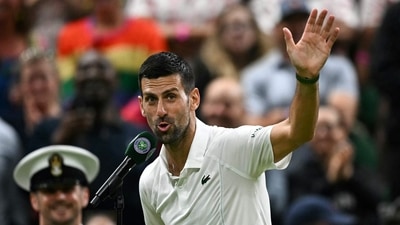 Winner Serbia's Novak Djokovic speaks during an interview and reacts to the behaviour of the crowd at the end of his Wimbledon singles match against Denmark's Holger Rune (AFP) Winner Serbia's Novak Djokovic speaks during an interview and reacts to the behaviour of the crowd at the end of his Wimbledon singles match against Denmark's Holger Rune (AFP)