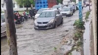 The Surajpur-Dadri road is completely damaged, pothole riddled and waterlogged, giving a tough time to commuters, residents said. (Ht Photo) The Surajpur-Dadri road is completely damaged, pothole riddled and waterlogged, giving a tough time to commuters, residents said. (Ht Photo)