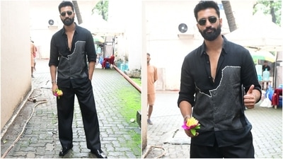 Vicky Kaushal promoted Bad Newz in Mumbai today, dressed in a sophisticated all-black look. He wore a printed button-down shirt, flared pants, dress shoes, sunglasses, a trimmed beard, and a backswept hairdo. (HT Photo/Varinder Chawla) Vicky Kaushal promoted Bad Newz in Mumbai today, dressed in a sophisticated all-black look. He wore a printed button-down shirt, flared pants, dress shoes, sunglasses, a trimmed beard, and a backswept hairdo. (HT Photo/Varinder Chawla)