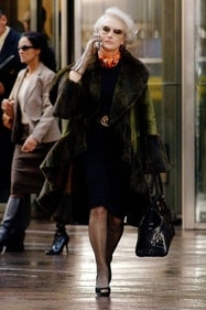 Priestly's orange scarf perfectly complemented her dark green coat Priestly's orange scarf perfectly complemented her dark green coat