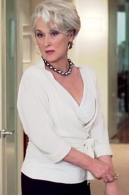 Miranda Priestly's white tied blouse is elegant while being work-appropriate Miranda Priestly's white tied blouse is elegant while being work-appropriate