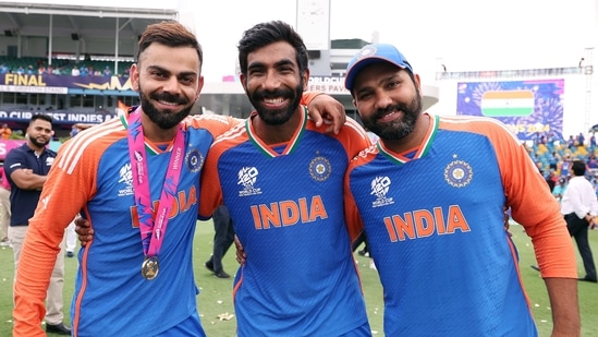 India's captain Rohit Sharma, Virat Kohli and Jasprit Bumrah pose for a group picture after Team India wins the ICC Mens T20 World Cup 2024 final(BCCI-X)
