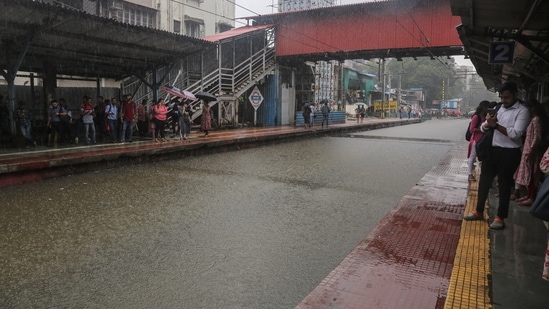 Chunabhatti Railway Station gets waterlogged amid heavy rain, in Mumbai on Monday. 