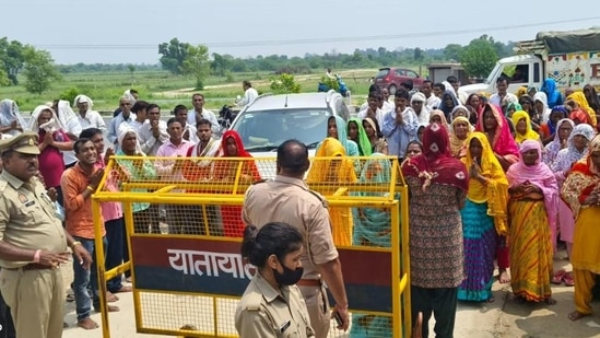 Followers gathered at Ashram of Bhole Baba in Bichwan town of Mainpuri on Tuesday. (HT)(HT_PRINT)