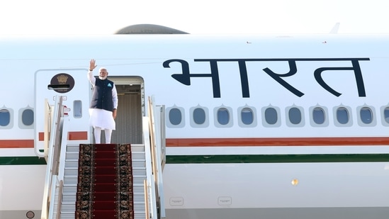 Latest news on July 9, 2024: Moscow, Jul 9 (ANI): Prime Minister Narendra Modi waves as he departs for Austria from Moscow for the second leg of his visit, on Tuesday. (ANI Photo)