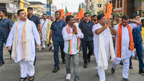 BJP leader Suvendu Adhikari and party state President and Union Minister of State Sukanta Majumdar during an election campaign rally ahead of the Raiganj Assembly Constituency bypoll, in North Dinajpur (PTI Photo)(PTI)