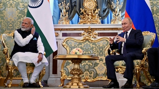 Russia's President Vladimir Putin and Prime Minister Narendra Modi attend a meeting at the Kremlin in Moscow. (Reuters)