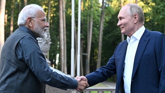 In photos: PM Modi, Putin hold private meeting in Russia at dinner ...