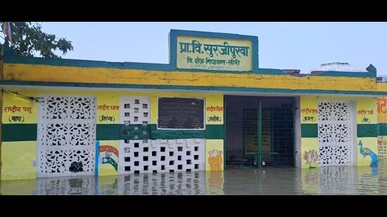 Submerged primary school of Ran Nagar in Kheri’s Nighasan Tehsil on Tuesday. (HT Photo)