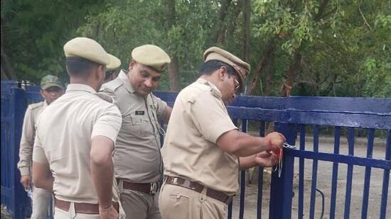 The district administration officials, forest officials and police personnel were present at the time of sealing on Tuesday. (HT Photo)