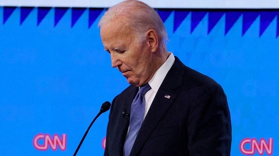 FILE PHOTO: Democratic presidential candidate U.S. President Joe Biden listens as Republican presidential candidate and former U.S. President Donald Trump speaks during their debate in Atlanta, Georgia, U.S., June 27, 2024. REUTERS/Brian Snyder//File Photo(REUTERS)