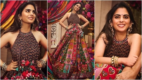 Isha Ambani attended her brother, Anant Ambani's Haldi ceremony in a custom tassel-adorned halter blouse and heart-embroidered lehenga skirt designed by Torani. She styled the ensemble with gold Chandbalis, kadhas, a statement ring, loose tresses, a dainty bindi, kohl-lined eyes, and brown lip shade.&nbsp;(Instagram)