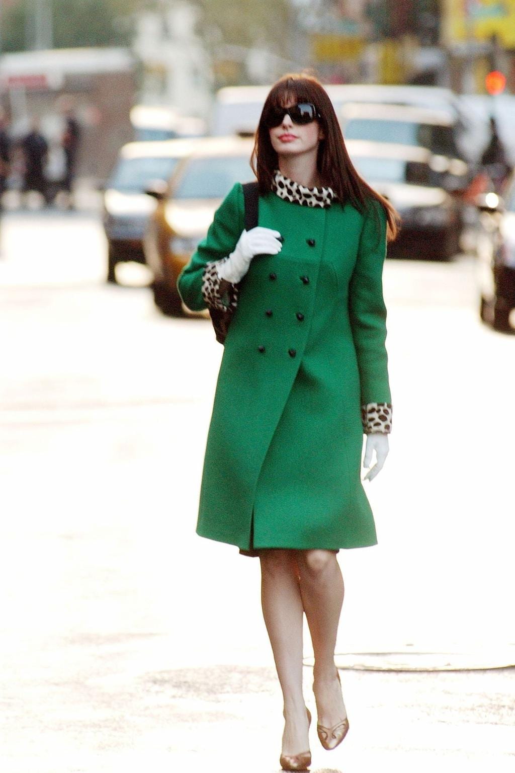 A bold green coat paired with cheetah print is a true sartorial choice