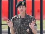 BTS member Jin posed for photographs after being discharged from the military in Yeoncheon, South Korea.(via REUTERS)