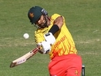 Zimbabwe's Sikandar Raza plays a shot during the T20I against India(AFP) Zimbabwe's Sikandar Raza plays a shot during the T20I against India(AFP)