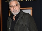 FILE - Director George Clooney attends a special screening of "The Boys in the Boat," Dec. 13, 2023, in New York. Movie star and lifelong Democrat George Clooney is adding his voice to calls for Joe Biden to leave the presidential race. Clooney says in a New York Times opinion piece Wednesday that he loves Biden, but the party would lose the presidential race as well as any control in Congress with him as the nominee. (Photo by Evan Agostini/Invision/AP, File) FILE - Director George Clooney attends a special screening of "The Boys in the Boat," Dec. 13, 2023, in New York. Movie star and lifelong Democrat George Clooney is adding his voice to calls for Joe Biden to leave the presidential race. Clooney says in a New York Times opinion piece Wednesday that he loves Biden, but the party would lose the presidential race as well as any control in Congress with him as the nominee. (Photo by Evan Agostini/Invision/AP, File)