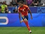 Lamine Yamal celebrates scoring his team's first goal in the Euro 2024 semi-final against France. 