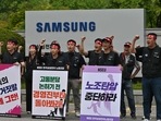A union representing tens of thousands of workers at Samsung Electronics in South Korea said on July 10 it would extend a three-day strike indefinitely in a bid to force management to negotiate. (Photo by Jung Yeon-je / AFP) A union representing tens of thousands of workers at Samsung Electronics in South Korea said on July 10 it would extend a three-day strike indefinitely in a bid to force management to negotiate. (Photo by Jung Yeon-je / AFP)