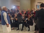 PM Modi was seen standing as a group of artists in Vienna sang 'Vande Mataram' on Tuesday.(PTI)