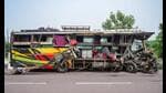 Mangled remains of the bus on a road after the accident, in Unnao district, Wednesday. (PTI Photo) Mangled remains of the bus on a road after the accident, in Unnao district, Wednesday. (PTI Photo)