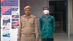 The 18-year-old man in police custody on Wednesday. (HT Photo) The 18-year-old man in police custody on Wednesday. (HT Photo)