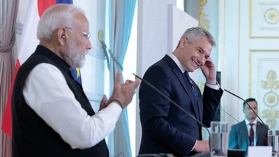 Austrian Chancellor Karl Nehammer (R) and Indian Prime Minister Narendra Modi give a joint press conference at the Chancellery in Vienna. (AFP)