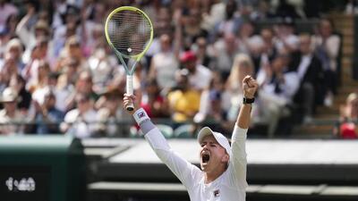 Czech Barbora Krejcikova celebrates after defeating Jelena Ostapenko of Latvia in the Wimbledon quarter-final on Wednesday. (AP) Czech Barbora Krejcikova celebrates after defeating Jelena Ostapenko of Latvia in the Wimbledon quarter-final on Wednesday. (AP)