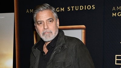 FILE - Director George Clooney attends a special screening of "The Boys in the Boat," Dec. 13, 2023, in New York. Movie star and lifelong Democrat George Clooney is adding his voice to calls for Joe Biden to leave the presidential race. Clooney says in a New York Times opinion piece Wednesday that he loves Biden, but the party would lose the presidential race as well as any control in Congress with him as the nominee. (Photo by Evan Agostini/Invision/AP, File) (Evan Agostini/Invision/AP) FILE - Director George Clooney attends a special screening of "The Boys in the Boat," Dec. 13, 2023, in New York. Movie star and lifelong Democrat George Clooney is adding his voice to calls for Joe Biden to leave the presidential race. Clooney says in a New York Times opinion piece Wednesday that he loves Biden, but the party would lose the presidential race as well as any control in Congress with him as the nominee. (Photo by Evan Agostini/Invision/AP, File) (Evan Agostini/Invision/AP)
