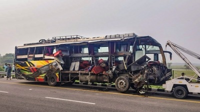 Mangled remains of a bus being towed after an accident, in Unnao district. (PTI) Mangled remains of a bus being towed after an accident, in Unnao district. (PTI)
