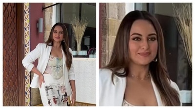 The newly wedded star has been spotted wearing an artsy, all-white ensemble. Sonakshi Sinha is wearing a corset and a long skirt, paired with a chic white blazer. The dress is from the new collaboration collection of H&M and Jean-Michel Basquiat Estate. The newly wedded star has been spotted wearing an artsy, all-white ensemble. Sonakshi Sinha is wearing a corset and a long skirt, paired with a chic white blazer. The dress is from the new collaboration collection of H&M and Jean-Michel Basquiat Estate. 