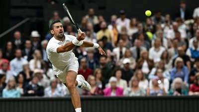 Serbia's Novak Djokovic returns the ball to Denmark's Holger Rune during their men's singles tennis match on the eighth day of the 2024 Wimbledon Championships (AFP) Serbia's Novak Djokovic returns the ball to Denmark's Holger Rune during their men's singles tennis match on the eighth day of the 2024 Wimbledon Championships (AFP)