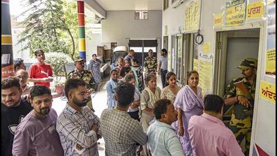 Voters standing in queues at a polling station to cast their votes during the Jalandhar West assembly byelection on Wednesday. (PTI Photo) Voters standing in queues at a polling station to cast their votes during the Jalandhar West assembly byelection on Wednesday. (PTI Photo)