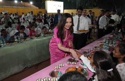 Nita Ambani serving food Nita Ambani serving food