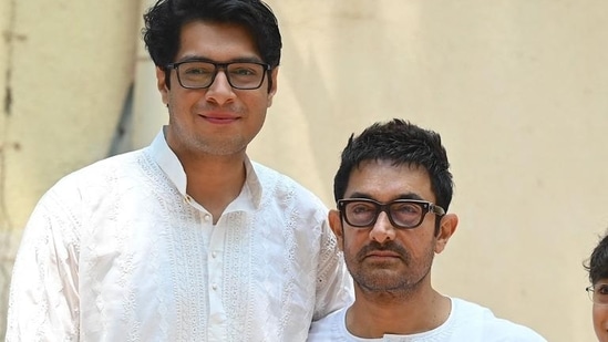 Aamir Khan with his eldest son Junaid Khan. (Photo by SUJIT JAISWAL / AFP) (AFP)