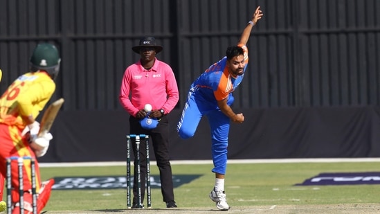 India's Avesh Khan delivers a ball during the third T20 international cricket match between Zimbabwe and India at Harare Sports Club in Harare on July 10, 2024.(AFP)