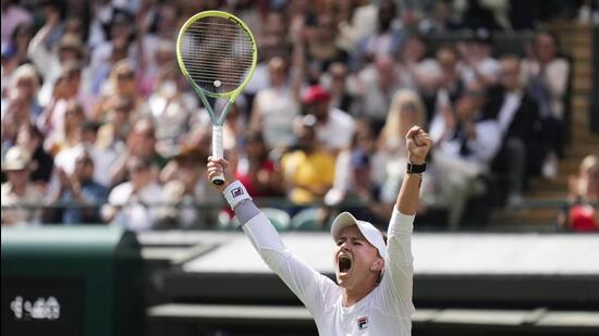 Czech Barbora Krejcikova celebrates after defeating Jelena Ostapenko of Latvia in the Wimbledon quarter-final on Wednesday. (AP)