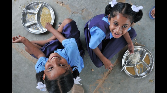 Jaipur, India-July 18: Children have Mid-day meal at a government school, in Jaipur, Rajasthan, India on Thursday, July 18, 2013. (photo by - Himanshu Vyas/Hindustan Times) (Hindustan Times)