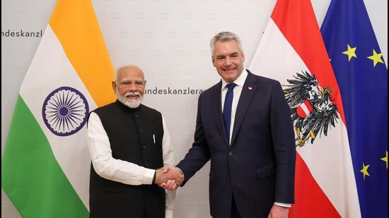 Prime Minister Narendra Modi with Austrian Chancellor Karl Nehammer in Vienna on Wednesday. (PTI)