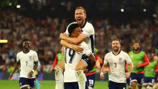 England's Harry Kane celebrates with Ollie Watkins after winning the match.(REUTERS)