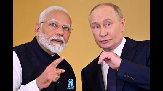 TOPSHOT - Russian President Vladimir Putin and Indian Prime Minister Narendra Modi attend a ceremony to decorate India's PM with the Order of St. Andrew the Apostle the First-Called following their talks at the Kremlin in Moscow on July 9, 2024. (Photo by Alexander NEMENOV / AFP) (AFP)