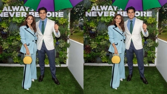 Kiara looked stunning as ever in a suave pantsuit, while Sidharth complemented her in a blue shirt, white blazer and grey trousers. (Getty Images)