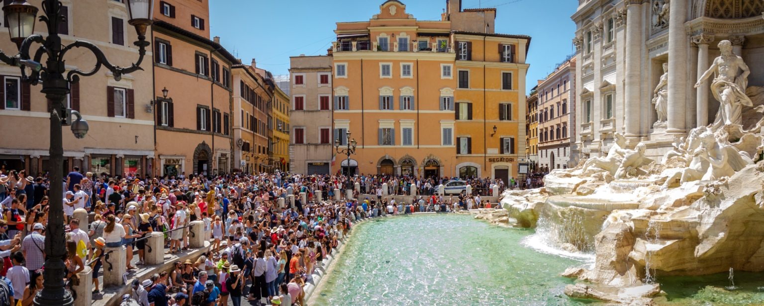 Tourists throng the famous Trevi Fountain in Rome(Solimar International)