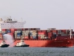 Tugboats offer water salute to MV San Fernando as they steer the mothership from China, through the breakwater channel to the Vizhinjam International Seaport, in Thiruvananthapuram on Thursday.(ANI) Tugboats offer water salute to MV San Fernando as they steer the mothership from China, through the breakwater channel to the Vizhinjam International Seaport, in Thiruvananthapuram on Thursday.(ANI)