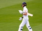 England's Ben Stokes walks back to the pavilion after losing his wicket, bowled out by West Indies' Gudakesh Motie