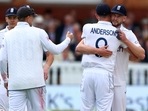 England's James Anderson celebrates with Gus Atkinson in the first Test against West Indies
