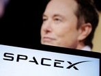 SpaceX logo and Elon Musk photo are seen in this illustration.