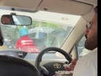 Bengaluru cab driver takes lunch break while stuck in traffic, eats his food. Watch Bengaluru cab driver takes lunch break while stuck in traffic, eats his food. Watch
