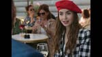 In Emily in Paris (2020 -), Emily tries to do too much, too soon. She’s teased for being “so American”. In Emily in Paris (2020 -), Emily tries to do too much, too soon. She’s teased for being “so American”.